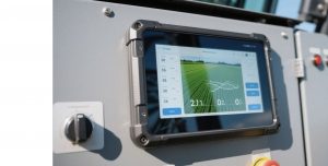 A modern, high-brightness ruggedized capacitive touch display with glove touch support for outdoor agricultural equipment.